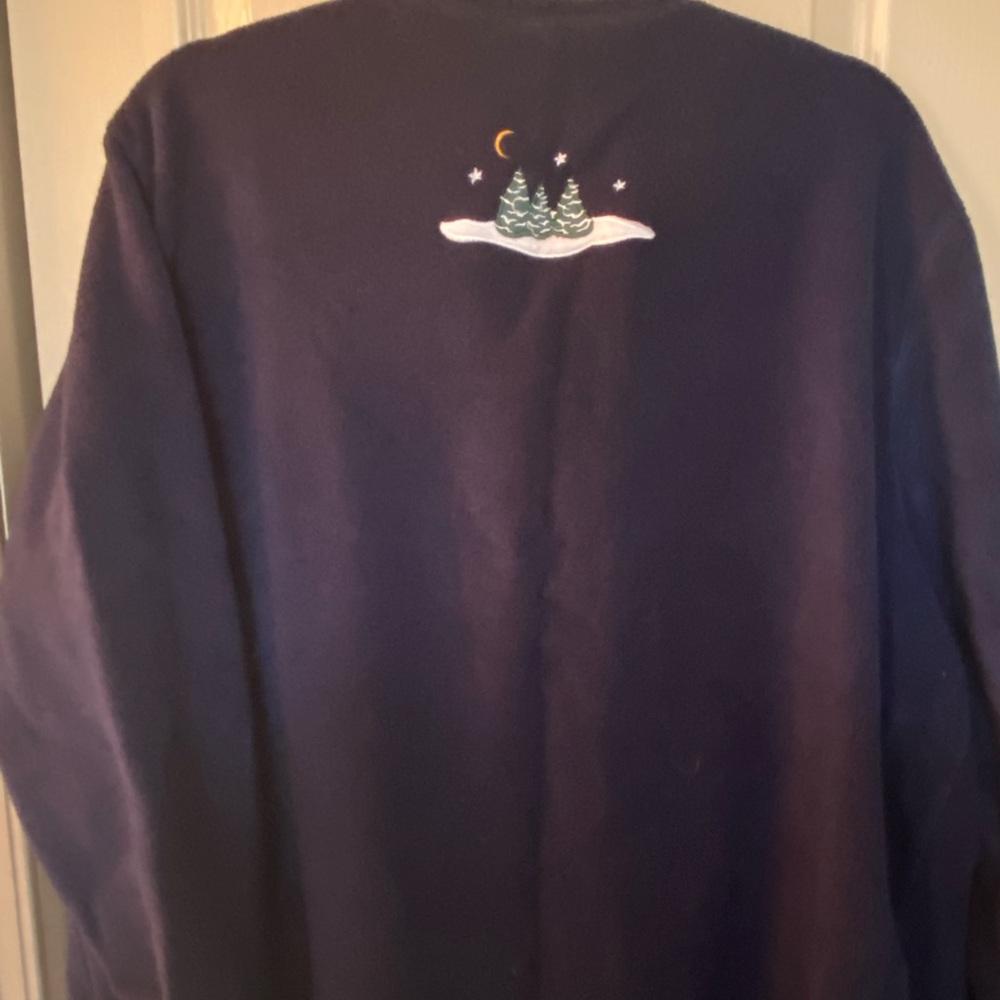 Navy Christmas sweater with star shaped white buttons. Like new